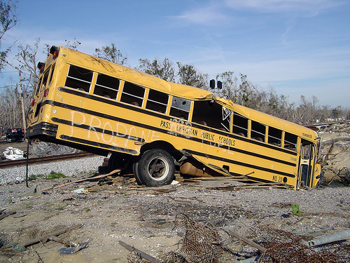 Post-Katrina School Bus Damaged school bus sits among wreckage in Post-Hurricane Katrina Mississippi