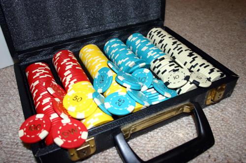 Set of Poker Chips in Case Set of multicolored poker chips in case