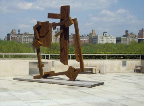 Square Tilt Joel Perlman sculpture Square Tilt framed by city skyline