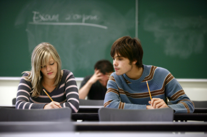Cheaters A student peering at the work of another student