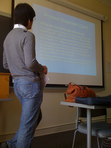 Student Presentation Photo of student giving a PowerPoint presentation